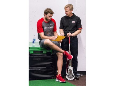 Ottawa Senators Bobby Ryan (L) talks with assistant coach Rob Cookson at the Canadian Tire Centre on the first day of training camp. September 13, 2018.