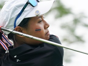 Thailand's Kultida Pramphun hits a shot during round three of the women's individual golf event at the 2018 Asian Games in Jakarta on August 25, 2018.