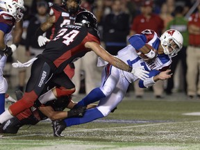 Ottawa Redblacks defensive back Anthony Cioffi (left) said the mood 
in the locker room remains upbeat. (The Canadian Press)