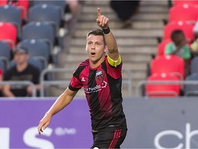 Ottawa Fury FC captain Carl Haworth celebrates after scoring a goal in the first half of a United Soccer League match against the Richmond Kickers.