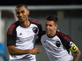 Fury’s Tony Taylor (left) and captain Carl Haworth celebrate Taylor’s goal in the fourth minute on Thursday night on the road against Toronto FC II. Ottawa won 4-3 to move into eighth place in the USL’s Eastern Conference standings. Toronto FC II photo