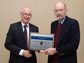 Dr. Hagen (l) receives his Award from Dr. Angus Maciver, Royal College of Physicians and Surgeons of Canada.