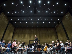 Music director of the National Arts Centre Orchestra Alexander Shelley looks on during the unveiling of upgrades to the NAC's Southam Hall, including a new orchestra shell for the performance venue, in Ottawa on Thursday, Sept. 6, 2018.
