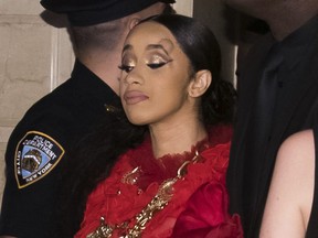 Cardi B, with a bump on her forehead, leaves after an altercation at the Harper's BAZAAR "ICONS by Carine Roitfeld" party at The Plaza in New York on Friday, Sept. 7, 2018.