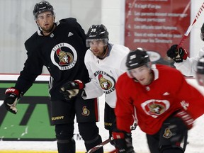 The Ottawa Senators' Chris Wideman, left, Colin White, centre and Matt Duchene take part in a drill during Senators training camp at the Canadian Tire Centre on Friday, Sept. 14, 2018.