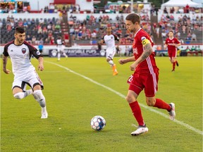 Fury FC's Chris Mannella keeps a close eye on Kickers captain Brian Shriver during Saturday's game at Richmond, Va.. Richmond Kickers photo