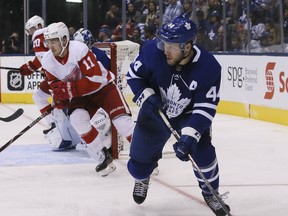 Maple Leafs defenceman Morgan Rielly carries the puck during pre-season action against the Detroit Red Wings on Friday. (Veronica Henri/Toronto Sun)