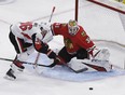 Senators' Colin White skates in on Blackhawks goaltender Anton Forsberg during the first period of Thursday's pre-season game in Chicago. (AP PHOTO)