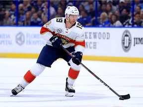 Mike Matheson of the Florida Panthers, seen here during a game against the Tampa Bay Lightning on Oct. 6, was suspended for two games by the NHL for slamming the Vancouver Canucks' Elias Petterson to the ice during a recent contest.