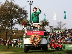In-Gee Chun of South Korea arrives for the winner's ceremony for the LPGA KEB Hana Bank Championship at Sky 72 Golf Club in Incheon on Sunday.