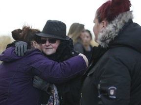 Joyce Mitchell (centre), the sister of missing teen Noreen Greenley, at the excavation which failed to turn up any sign of the missing girl. (Veronica Henri, Toronto Sun)