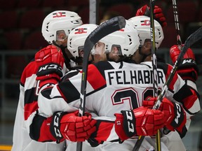 67s celebrate a victory over the Sudbury Wolves, October 28, 2018. Photo Greg Kolz