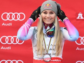 In this file photo taken on March 14, 2018, skiier Lindsey Vonn poses on the podium after coming in second place at the FIS Downhill World Cup event, in Aare, Sweden. (JONATHAN NACKSTRAND/AFP/Getty Images)