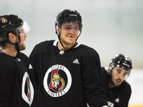 Senators defenceman Mark Borowiecki (middle) has been suspended one game by the NHL.