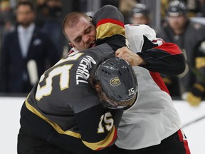 Vegas Golden Knights defenceman Jon Merrill  fights Senator Mark Borowiecki after Borowiecki’s hit on Cody Eakin on Sunday. Borowiecki was suspended for three games. AP PHOTO