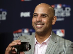 Boston Red Sox manager Alex Cora smiles while speaking at a baseball news conference, Thursday, Oct. 25, 2018, in Los Angeles, ahead of Friday's Game 3 of the team's World Series against the Los Angeles Dodgers. (AP Photo/Jae C. Hong)