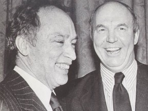 Pierre Trudeau, left, and Donald Macdonald share a laugh in this 1979 file photo. (Postmedia Network files)