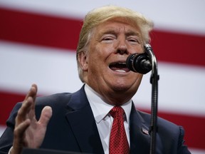 U.S. President Donald Trump speaks during a campaign rally at the Mayo Civic Center, Thursday, Oct. 4, 2018, in Rochester, Minn.