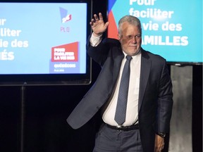 Quebec Liberal Leader Philippe Couillard waves to supporters after he lost the general election to a majority CAQ government on Monday, Oct. 1, 2018.