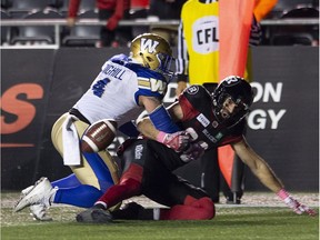 Blue Bombers linebacker Adam Bighill forced a fumble by Redblacks receiver Brad Sinopoli in overtime. Winnipeg recovered the loose ball to clinch a 40-32 victory.