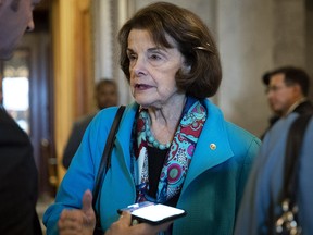 Sen. Dianne Feinstein talks to reporters as she exits the Senate floor October 6, 2018 in Washington, DC. (Drew Angerer/Getty Images)
