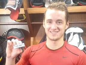 The Ottawa Senators' Max Lajoie shows off the puck after scoring his first career NHL goal in his debut game on Thursday, Oct. 4, 2018 at the Canadian Tire Centre. Bruce Garrioch, Postmedia