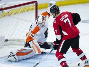 Ottawa Senators left wing Brady Tkachuk scores on Philadelphia Flyers goaltender Calvin Pickard during first period NHL action Wednesday October 10, 2018 in Ottawa.