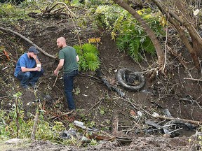 Distraught family members take in the scene Oct. 7, 2018 in Schoharie, N.Y., one day after an accident that left 20 people dead.