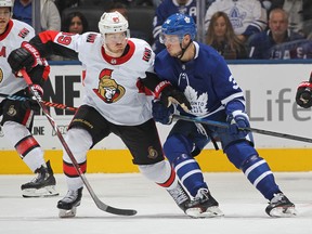 Senators’ Mikkel Boedker (left) fights for positioning with Maple Leafs’ Auston Matthews during a game earlier this month in Toronto. Boedker, acquired from San Jose in the Mike Hoffman deal, scored his first goal with Ottawa on Monday. (GETTY IMAGES)