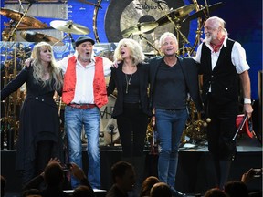 A photo taken Jan. 26 shows Fleetwood Mac band members, from left, Stevie Nicks, John McVie, Christine McVie, Lindsey Buckingham and Mick Fleetwood at the 2018 MusiCares Person of the Year tribute honoring Fleetwood Mac in New York. Buckingham is out of the band for its current tour.