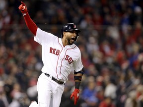 Eduardo Nunez of the Boston Red Sox celebrates his three-run home run during the seventh inning against the Los Angeles Dodgers in Game 1 of the World Series at Fenway Park on October 23, 2018 in Boston. (GETTY IMAGES)