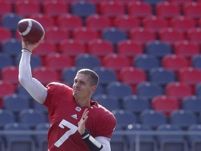 Redblacks quarterback Trevor Harris throws a pass during practice at TD Place stadium on Tuesday.   Tony Caldwell/Postmedia