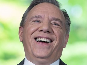 Quebec Premier-designate François Legault speaks to the media the day after after winning the provincial election.