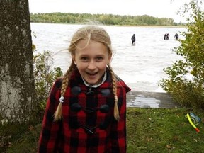 Saga Vanecek, 8, was helping her father with his boat in the Vidostern lake in Sweden when she stepped on an 85-centimetre (34-inch) sword in a holster made of wood and leather. (Andy Vanecek)