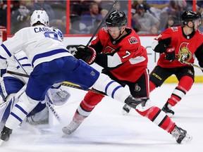 Brady Tkachuk, right, in action in a Senators preseason game against the Maple Leafs. He missed the first two regular-season contests because of a groin injury.  Wayne Cuddington/Postmedia