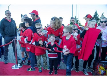 Young Sens fans line up along the red carpet to catch a glimpse of the players before the season opener at the CTC.