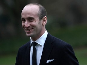 White House adviser Stephen Miller walks on the South Lawn after he returned to the White House in Washington, D.C., Dec. 15, 2017.