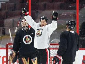Mark Stone (right) of the Senators mock celebrates his goal on Craig Anderson during practice at the Canadian Tire Centre on Wednesday. (Jean Levac/Postmedia Network)