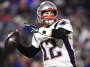 New England Patriots quarterback Tom Brady looks to pass against the Buffalo Bills Monday, Oct. 29, 2018, in Orchard Park, N.Y. (AP Photo/Adrian Kraus)