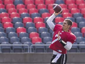 Redblacks quarterback Trevor Harris throws during Tuesday’s practice at TD Place Stadium. (Errol McGihon/Ottawa Sun)