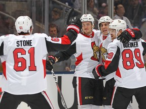 The Senators celebrate Dylan DeMelo’s goal against the Maple Leafs on Saturday night in Toronto. (GETTY IMAGES)