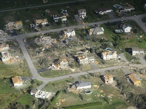 Damage from a tornado is seen in Dunrobin, Ont., west of Ottawa on Saturday, Sept. 22, 2018. The storm tore roofs off of homes, overturned cars and felled power lines in the Ottawa community of Dunrobin and in Gatineau, Que.