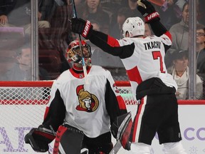 Senators goalie Mike McKenna and Brady Tkachuk, both from St. Louis, celebrate after a win in Philadelphia on Tuesday, Nov. 27, 2018.