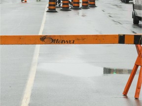 Signs and cones to redirect traffic.