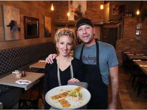 Josh Gillard and his wife Laurie, owners of Amuse Kitchen, with some of Gillard's dishes - Duck main course and salmon tartare.