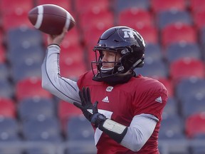 Ottawa Redblacks' Trevor Harris throws a pass during practice on Wednesday. (TONY CALDWELL/Ottawa Sun)