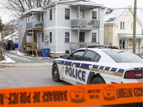 A Gatineau police cruiser sits at the scene of a homicide on Saint-Paul Street on Wednesday, Nov. 15, 2018. Errol McGihon/Postmedia