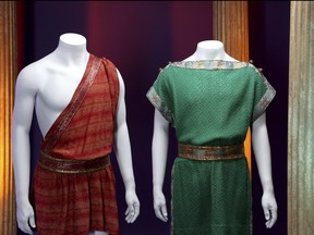 This image released by The Comisar Collection shows costumes worn by characters Captain Kirk and Spock from the "Star Trek" TV series, which are among 400 items from his memorabilia collection up for auction on Dec. 1. (The Comisar Collection via AP)