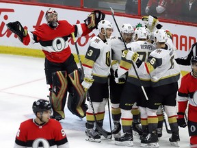 Senators goaltender Craig Anderson (left) looks for a goaltender interference call against the Vegas Golden Knights to no avail on Thursday.(Fred Chartrand/The Canadian Press)