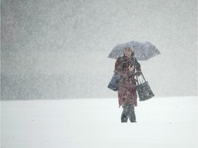 A person walks in the snow.